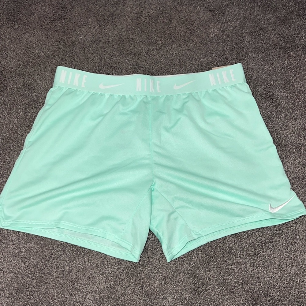 Green nike shorts